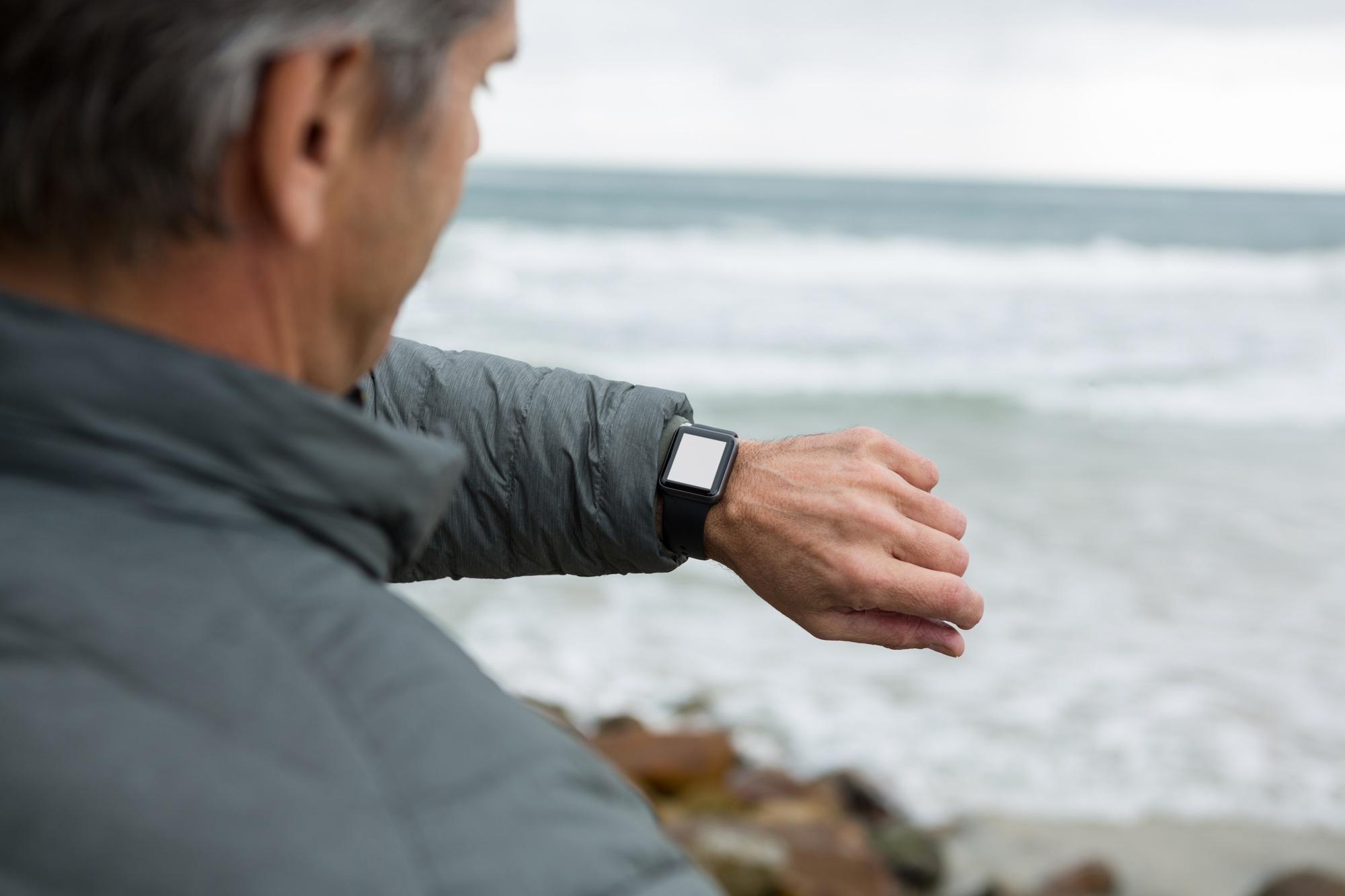 Man checking the time on smartwatch